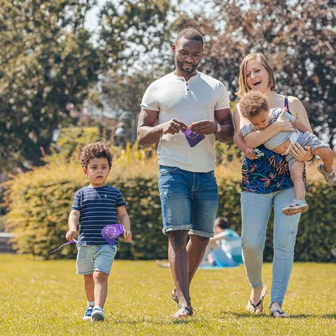 Family walking together in a park